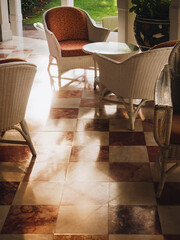 Wicker chair classic style interior with morning sunlight