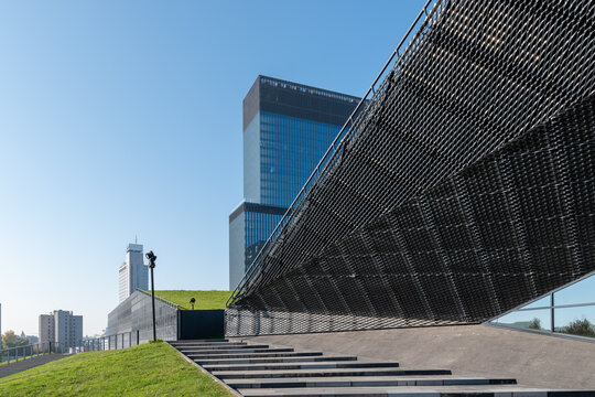 Katowice city: International Congress Centre MCK, skyscrapers KTW and Altus and some residential block in the background. Modern, futuristic architecture in Silesia, Poland.