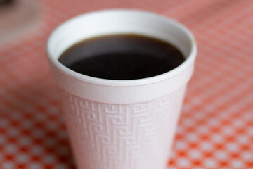 black coffee in disposable Styrofoam cup