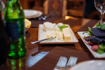 Laid table in the restaurant. Beautiful serving. Reserved table in the restaurant.