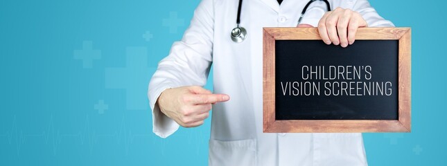 Children's vision screening. Doctor shows medical term on a sign/board