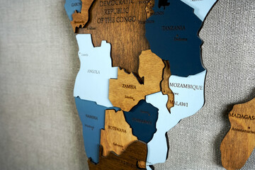 East Africa on the political map. Tanzania, Mozambique, Zambia, Botswana, Zimbabwe on wooden world...