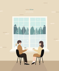 On a snowy winter, a couple drinking coffee inside a cafe