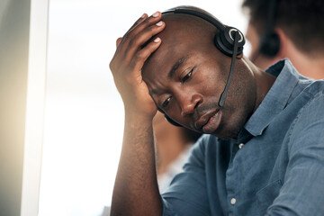 Call center, stress and black man sad about telemarketing depression, problem or work in a crm...