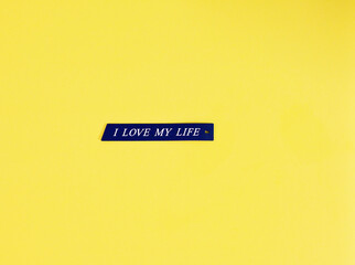I love my life tag sentence alphabet on yellow colourful background, you enjoy your happy life,...