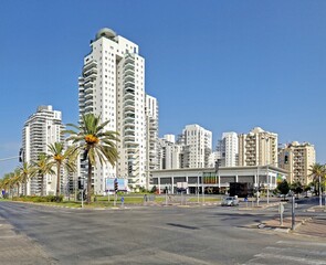 New residential area with modern houses and  large landscaping of the territory of the city of Holon in Israel.