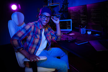 Profile portrait of positive hacker guy sit chair touch eyeglasses improve cybersecurity server...