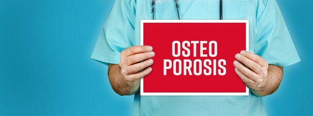 Osteoporosis. Doctor shows red sign with medical word on it. Blue background.