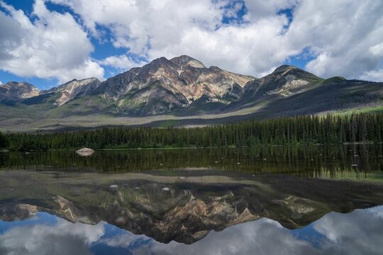 Landscape shot of the Pyramid mountain and its reflection in Pyramid Lake Jasper National Park