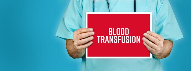 Blood transfusion. Doctor shows red sign with medical word on it. Blue background.