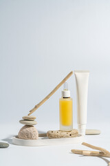 Two bottles for cosmetics without a logo on a light background. Mockup cosmetics