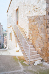 Kitty cat on old town street.