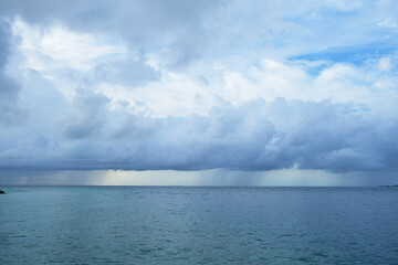 Fototapeta na wymiar The monsoon season of Rasdhoo, with heavy gray cloud and rain, Maldives.