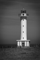 Cabo de Lastres lighthouse in Luces-Colunga, in Asturias. Spain. Black and white photo