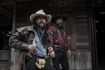 Fototapeta premium man with gun. Portrait cowboy with gun.