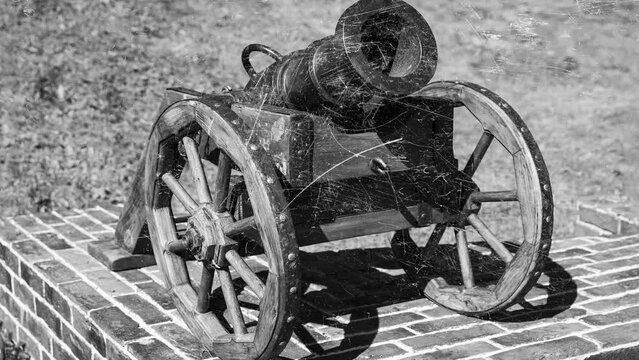 old vintage cannon with flashing white scratches