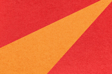 Fototapeta premium Texture of old craft red and orange color paper background, macro. Structure of vintage abstract ruby cardboard