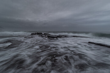 Morning seascape view with stormy sky.