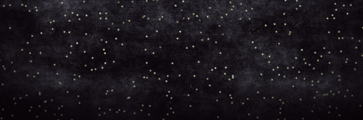 Fototapeta Dark gradient panoramic banner with glitter shiny stars and sparkle lighter part, starry golden shining. Visual shapes, golden starry dust worn background. Stardust New Year celebration design	
 obraz