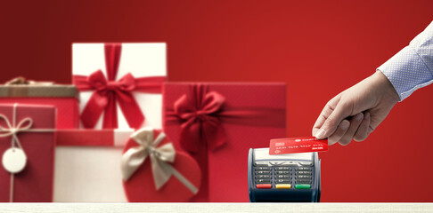 Customer buying Christmas gifts with a credit card