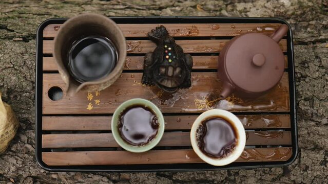 close-up. view from above. tea set for chinese tea ceremony. dark pu-erh