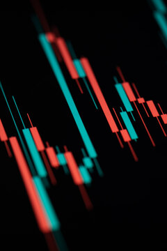 Digital screen with financial trading chart and cryptocurrency price trend.