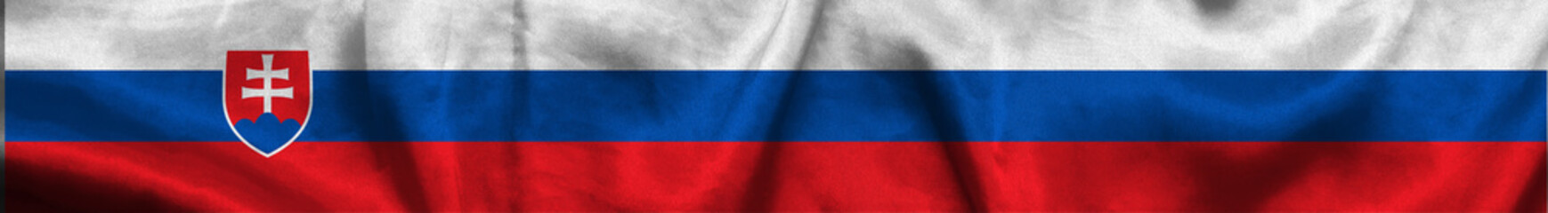 Elongated national flag of Slovakia, with a fabric texture fluttering in the wind. Slovak Republic flag for website design. 3d illustration