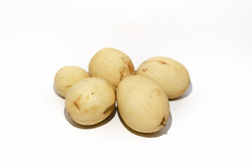 Langsat duku Lansium domesticum put on isolated white background. This fruit commonly grow in Southeast Asia