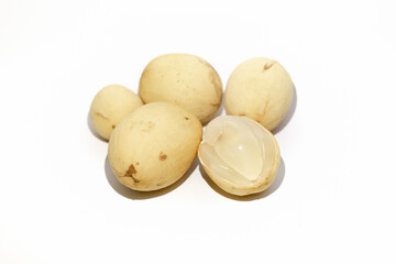 Langsat duku Lansium domesticum put on isolated white background. This fruit commonly grow in Southeast Asia