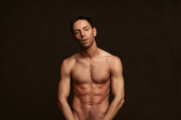 Fototapeta premium Young attractive guy and problems with men's health.