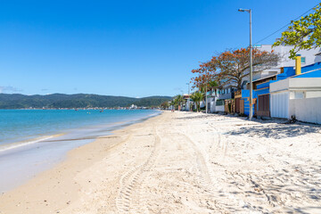 Beach with sand and houses