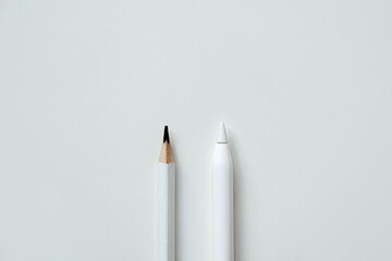 electronic stylus and wooden plain pencil, technology development concept and new generation