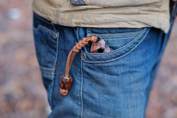 - Exclusive handmade knife in denim pocket of man