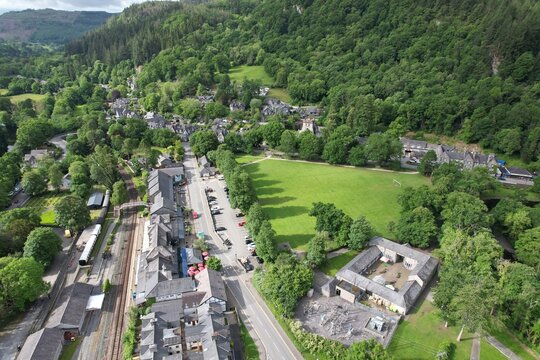 Railway station and car park Betws y coed north Wales UK drone aerial view ..