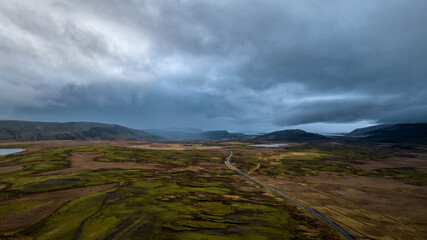 aerial view on iceland road with moss and mountains
