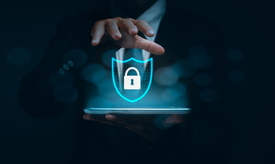 Businessman showing hands to protect personal information with virtual padlock icon, technological security concept, data theft prevention on the online digital network, cyber security