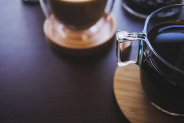 black coffee on a wooden table and copy space - 542983946