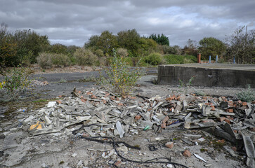 Piles of broken asbestos on site of former chemical plant