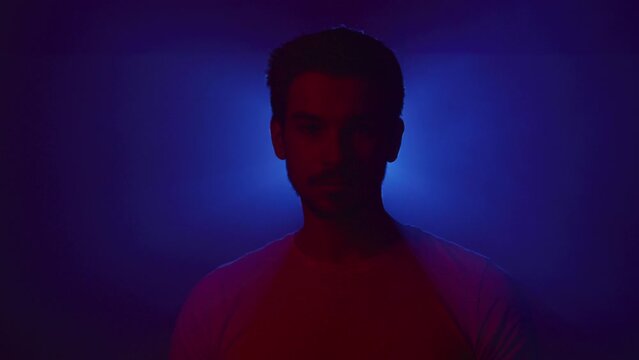 Light projection behind a young man