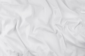 White fabric. luxurious white fabric texture background. Creases of satin, silk, and cotton.