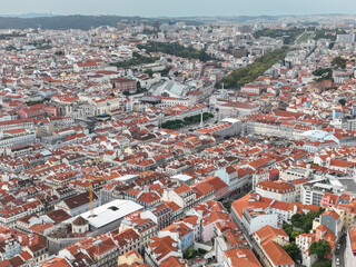 Lisbon Downtown and Old Town with Sightseeing Objects in Background. Portugal. Drone Point of View