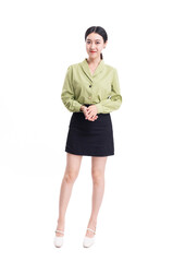 Fototapeta premium A business woman in a green suit and a black skirt against a white background