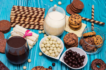 Chocolate milk with heap of sweets