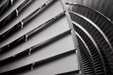 Rotor with blades of powerful steam turbine in workshop