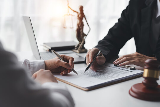 Businessman and lawyer discuss and advice on contract documents. Legal Treaty Agreement business contract