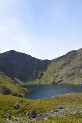 Naklejka na ściany i meble a view looing down in the crater of Cadair Idris with a mountain view behind it