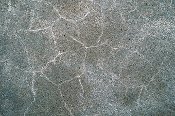 Old concrete wall with abstract cracks. Soft focus