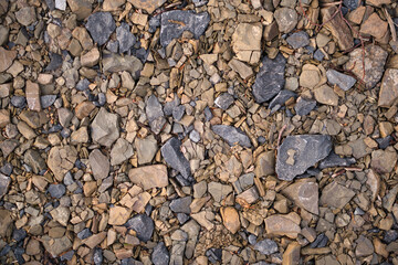 Structure of a gray brown stone floor photographed from above