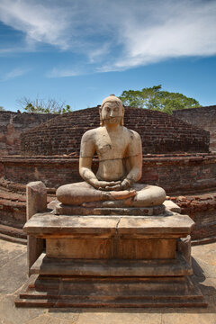 Ancient sitting Buddha image in votadage. Polonnaruwa, Sri Lanka