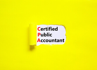 CPA certified public accountant symbol. Concept words CPA certified public accountant on white paper on a beautiful yellow background. Business and CPA certified public accountant concept. Copy space.